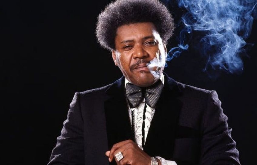 Images of a famous boxing promoter, Don King