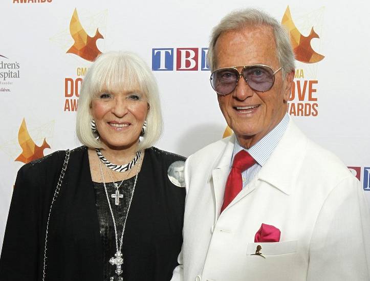 Pat Boone in white suit with his wife, Shirley